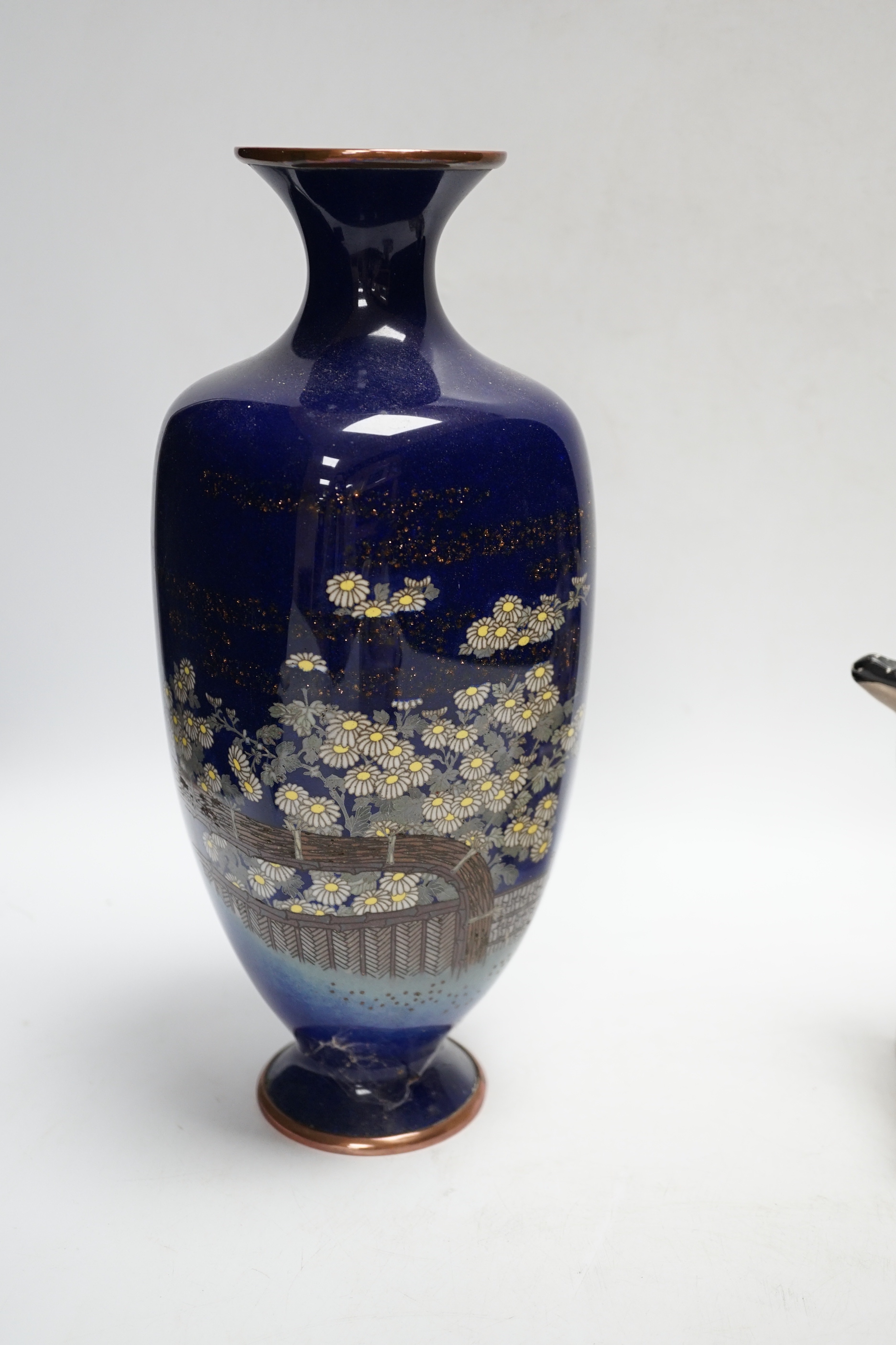 A pair of Japanese earthenware bookends and a Japanese cloisonné enamel vase, decorated in the musen and silver wire technique, vase 30cm